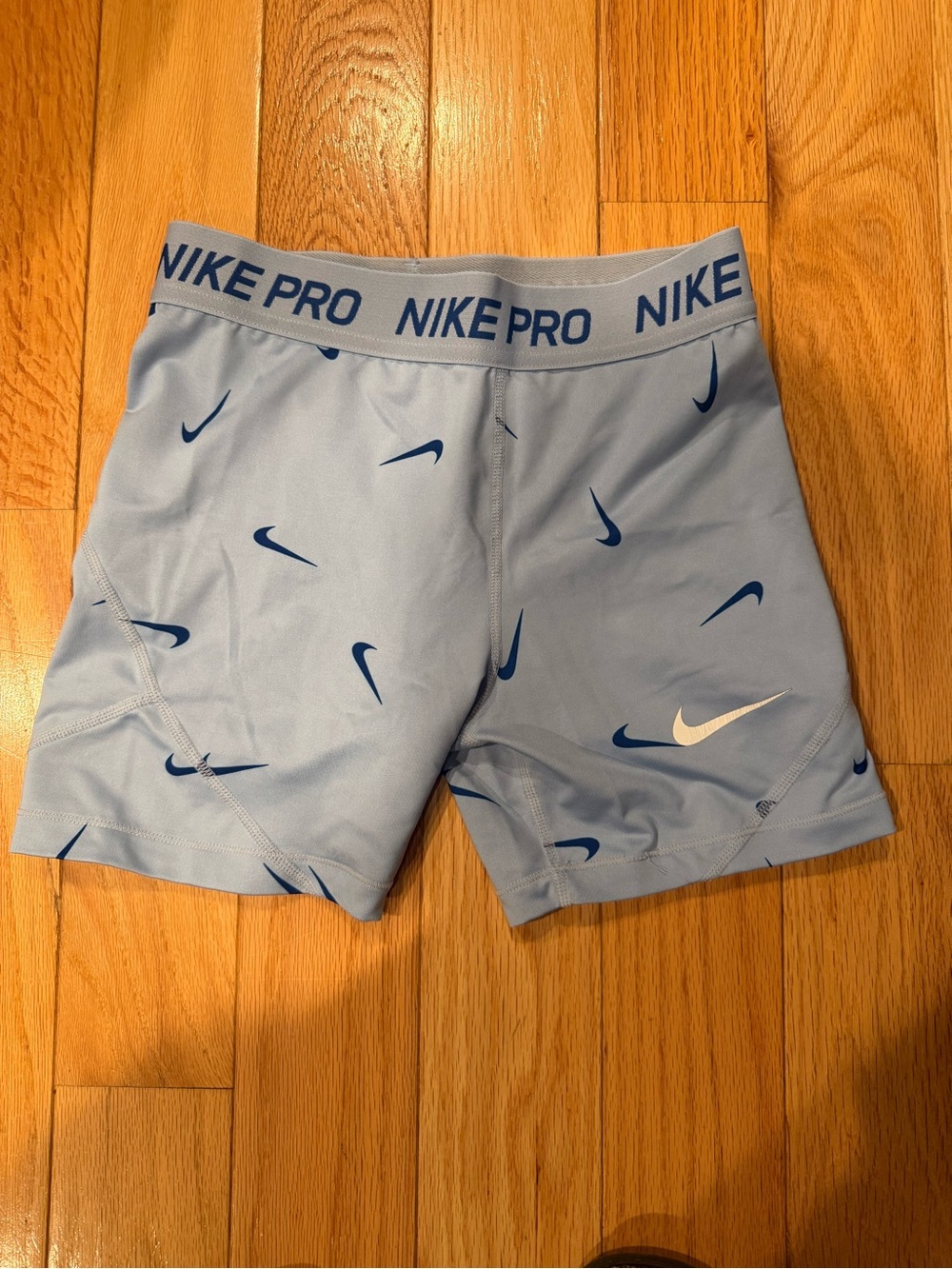 Nike Light Blue Training Compression Shorts with Navy Swoosh Accents